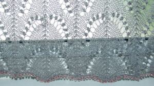 lace curtain bottom edge of center panel